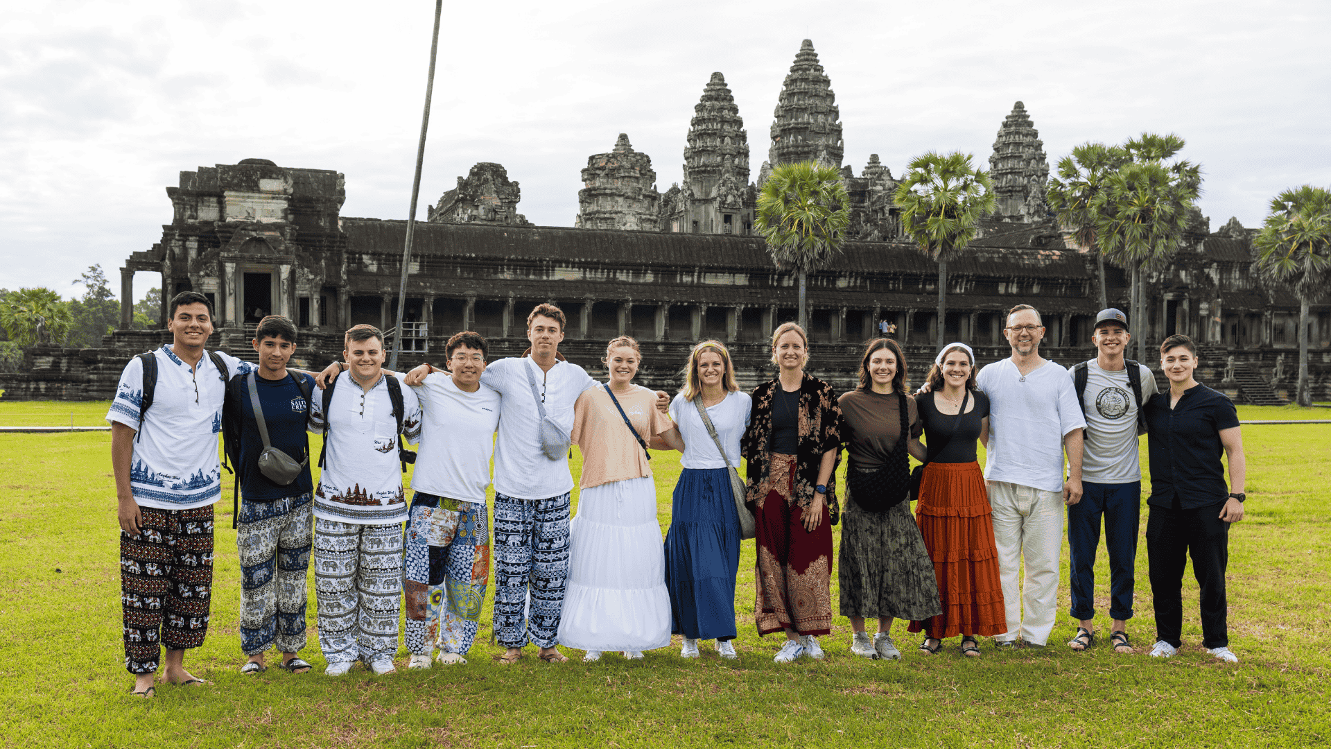 A group of Projects Abroad volunteers pose in front of Angkor Wat in Cambodia